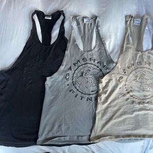 Gymshark Men's Tank Tops in Black, Gray, and Beige